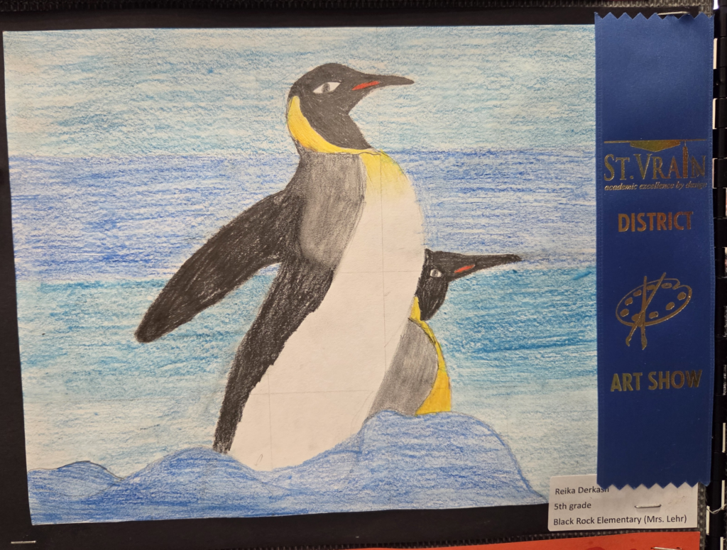 A colorful drawing of two penguins standing on ice with a blue sky in the background, displayed at an art show.